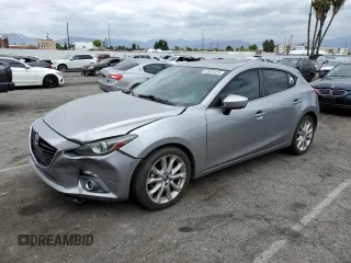 2014 Mazda 3 S Grand Touring with VIN JM1BM1M33E1198145, listed as a Copart auction lot 52820425 with 105,576 mi miles and Salvage Title. Bid and sale history available at DreamBid. Image 1.