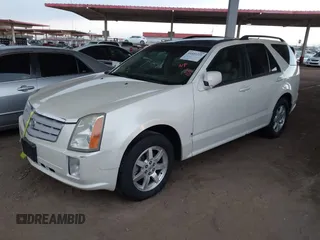 2008 Cadillac SRX AWD with VIN 1GYEE637X80102608, listed as a IAAI auction lot 41451221 with 151,552 mi miles. Bid and sale history available at carsss.com. Image 2.