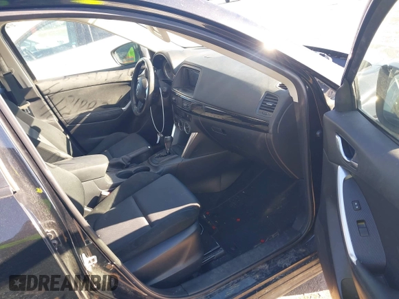 2014 Mazda CX-5 Sport with VIN JM3KE2BE7E0313978, listed as a IAAI auction lot 41437144 with 161,181 mi miles and . Bid and sale history available at carsss.com. Image 5.