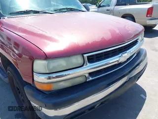 2004 Chevrolet Tahoe LT z VIN 1GNEC13Z44J281353, wystawiony jako IAAI lot #42317558 z przebiegiem 373 908 mil mil oraz . Historia ofert i sprzedaży dostępna na DreamBid. Obrazek 6.