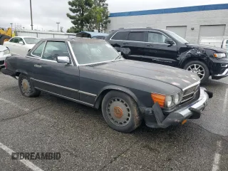 1987 Mercedes-Benz 560 Series 560SL with VIN WDBBA48D0HA066539, listed as a Copart auction lot 51283015 with 312,335 mi miles and Clean Title. Bid and sale history available at carsss.com. Image 4.