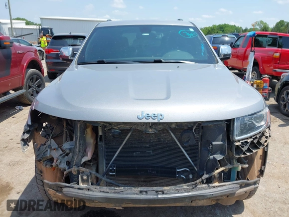 2014 Jeep Grand Cherokee Limited with VIN 1C4RJFBG4EC589321, listed as a IAAI auction lot 42335043 with 153,428 mi miles and . Bid and sale history available at DreamBid. Image 13.