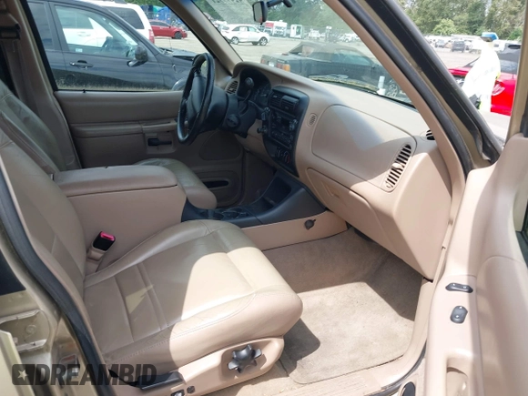 2001 Ford Explorer XLT z VIN 1FMZU73E71ZA79770, wystawiony jako IAAI lot #42499921 z przebiegiem 174 050 mil mil oraz . Historia ofert i sprzedaży dostępna na DreamBid. Obrazek 5.