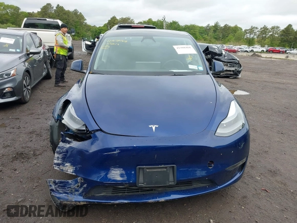 2024 Tesla Model Y Performance z VIN 7SAYGDEF1RA265382, wystawiony jako IAAI lot #42308468 z przebiegiem 9 700 mil mil oraz . Historia ofert i sprzedaży dostępna na DreamBid. Obrazek 12.