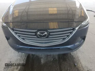 2021 Mazda CX-9 Touring with VIN JM3TCACY7M0528188, listed as a Copart auction lot 53880865 with 63,581 mi miles and Salvage title. Bid and sale history available at DreamBid. Image 12.