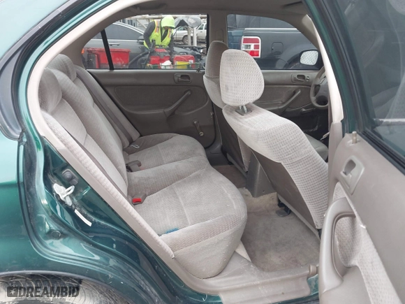 1999 Honda Civic VP with VIN 2HGEJ6617XH537283, listed as a IAAI auction lot 41483084 with 153,655 mi miles. Bid and sale history available at carsss.com. Image 8.