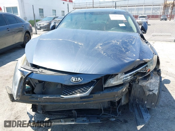 2015 Kia Optima LX with VIN 5XXGM4A70FG438174, listed as a IAAI auction lot 42267399 with 132,406 mi miles and . Bid and sale history available at DreamBid. Image 6.