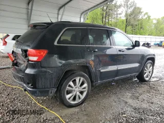 2012 Jeep Grand Cherokee Laredo with VIN 1C4RJEAG1CC316703, listed as a Copart auction lot 52128105 with 203,896 mi miles and Salvage Title. Bid and sale history available at carsss.com. Image 3.