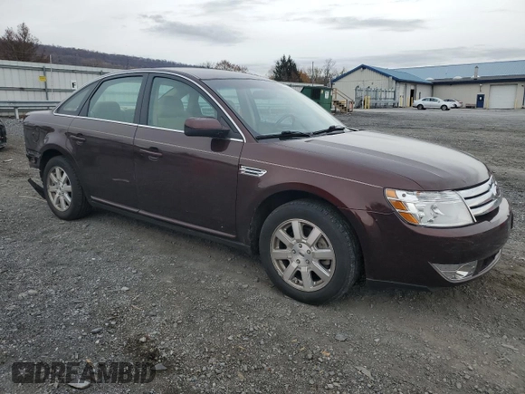 2009 Ford Taurus SE with VIN 1FAHP23W89G125025, listed as a Copart auction lot 80710004 with 114,176 mi miles and Salvage Title. Bid and sale history available at carsss.com. Image 4.