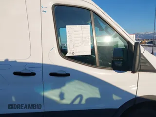 2023 Ford Transit Cargo with VIN 1FTBR1C81PKA63841, listed as a IAAI auction lot 41582275 with 33,915 mi miles and . Bid and sale history available at DreamBid. Image 14.