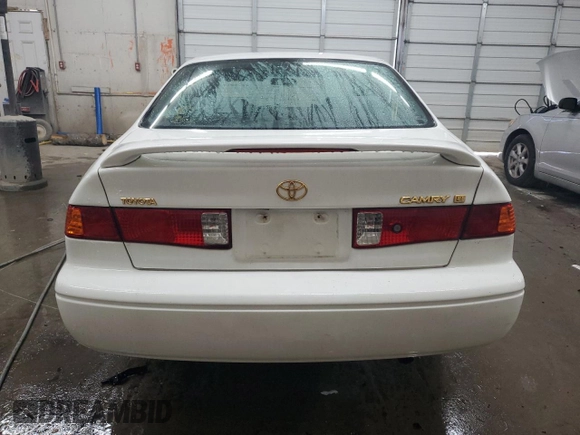 2000 Toyota Camry CE with VIN 4T1BG22K7YU996749, listed as a Copart auction lot 41957205 with 197,160 mi miles and Salvage Title. Bid and sale history available at carsss.com. Image 6.