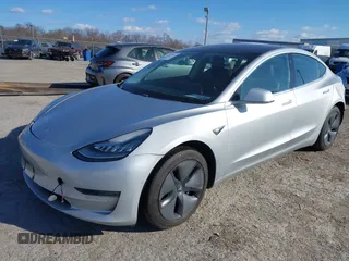 2018 Tesla Model 3 Long Range Battery with VIN 5YJ3E1EB9JF065057, listed as a IAAI auction lot 41863903 with 54,584 mi miles and . Bid and sale history available at DreamBid. Image 19.