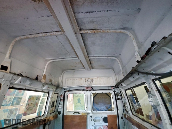 2001 Ford Econoline Passenger XL with VIN 1FBSS31LX1HA03315, listed as a Copart auction lot 65772875 with 108,184 mi miles and Clean title. Bid and sale history available at DreamBid. Image 10.