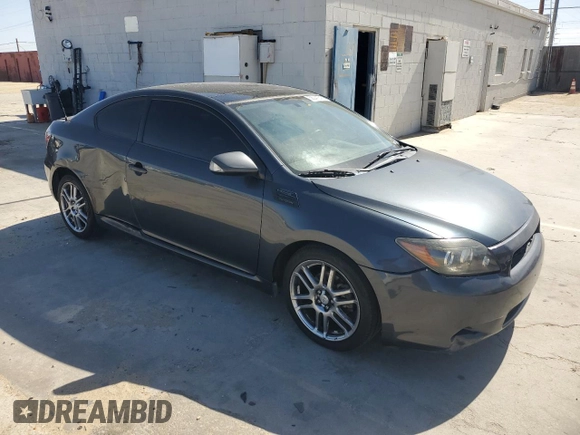 2008 Scion tC Spec with VIN JTKDE167480228701, listed as a Copart auction lot 56041645 with 181,479 mi miles and Salvage Title. Bid and sale history available at DreamBid. Image 4.