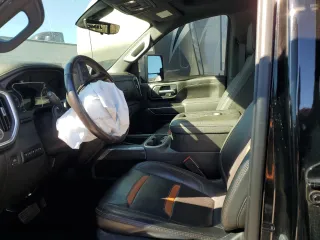 2021 GMC Sierra 2500HD AT4 with VIN 1GT49PEY6MF250229, listed as a Copart auction lot 89206225 with 77,462 mi miles and Salvage Title. Bid and sale history available at carsss.com. Image 7.