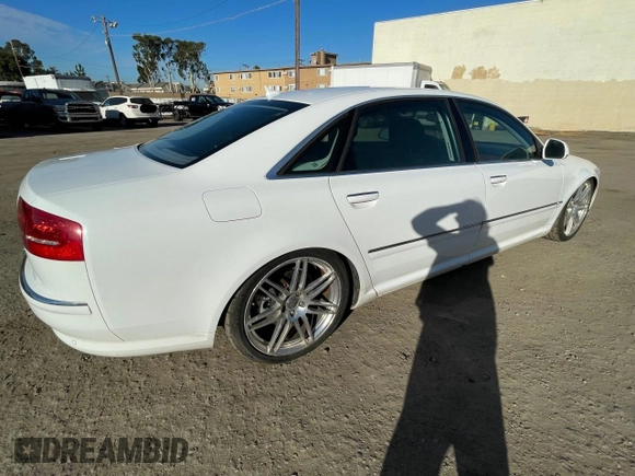 2009 Audi A8 4.2L with VIN WAUMV94E19N002897, listed as a Copart auction lot 64525445 with 140,526 mi miles and Clean title. Bid and sale history available at DreamBid. Image 4.