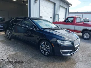 2017 Lincoln MKZ Premiere z VIN 3LN6L5A99HR645409, wystawiony jako IAAI lot #41992396 z przebiegiem 121 506 mil mil oraz . Historia ofert i sprzedaży dostępna na DreamBid. Obrazek 1.