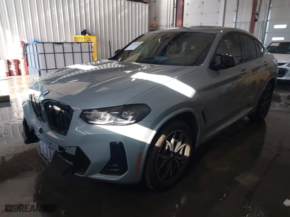 2023 BMW X4 M40i with VIN 5UX43DT03P9R26280, listed as a IAAI auction lot 41318355 with 21,587 mi miles. Bid and sale history available at carsss.com. Image 17.