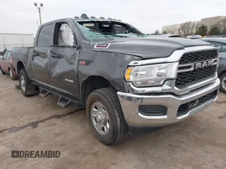 2021 Ram 2500 Tradesman z VIN 3C6UR5CJ2MG639305, wystawiony jako IAAI lot #41735666 z przebiegiem 69 301 mil mil oraz . Historia ofert i sprzedaży dostępna na DreamBid. Obrazek 1.