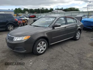 2010 Kia Optima LX z VIN KNAGG4A80A5388175, wystawiony jako Copart lot #57532495 z przebiegiem 79 201 mil mil oraz Szkoda całkowita • Salvage title. Historia ofert i sprzedaży dostępna na DreamBid. Obrazek 1.