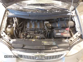 2003 Ford Windstar SE with VIN 2FMZA52413BB09700, listed as a IAAI auction lot 41037056 with 179,486 mi miles and . Bid and sale history available at DreamBid. Image 10.