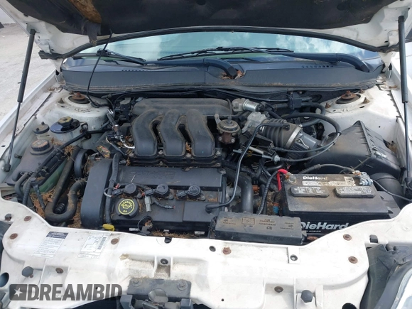 2000 Mercury Sable LS Premium z VIN 1MEFM55S6YA628641, wystawiony jako IAAI lot #41875950 z przebiegiem 35 453 mil mil oraz . Historia ofert i sprzedaży dostępna na DreamBid. Obrazek 10.
