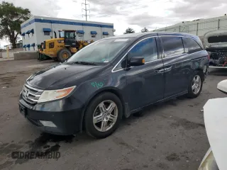 2012 Honda Odyssey Touring с VIN 5FNRL5H98CB086081, выставлен на аукционе Copart как лот 58845455 с пробегом 192 299 миль миль и Списание • Salvage title. История ставок и продаж доступна на DreamBid. Изображение 1.