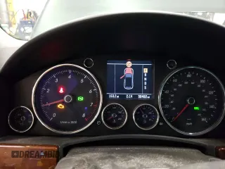 2004 Volkswagen Touareg z VIN WVGCM67L94D032492, wystawiony jako Copart lot #72205044 z przebiegiem 98 482 mil mil oraz Tytuł czysty. Historia ofert i sprzedaży dostępna na DreamBid. Obrazek 9.