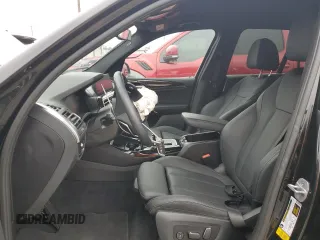 2024 BMW X3 sDrive30i with VIN WBX47DP01RN277348, listed as a Copart auction lot 55596065 with 8,151 mi miles and Salvage Title. Bid and sale history available at DreamBid. Image 7.