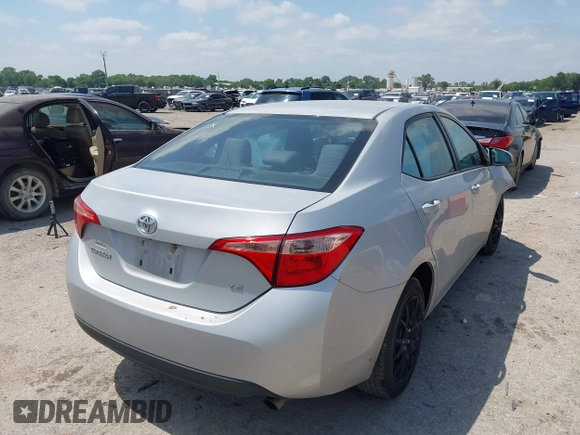 2018 Toyota Corolla L with VIN 2T1BURHE6JC974560, listed as a IAAI auction lot 42380518 with 155,926 mi miles and . Bid and sale history available at DreamBid. Image 4.