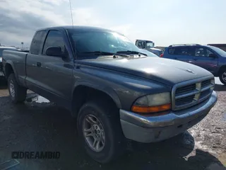 2004 Dodge Dakota SLT with VIN 1D7HG42N44S618405, listed as a IAAI auction lot 40895893 with 172,324 mi miles. Bid and sale history available at carsss.com. Image 1.