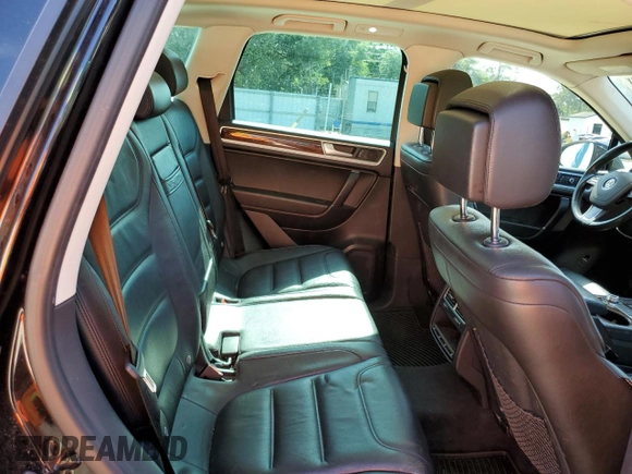 2015 Volkswagen Touareg Lux с VIN WVGEP9BP4FD004212, выставлен на аукционе Copart как лот 54021345 с пробегом 156 164 миль миль и Списание • Salvage title. История ставок и продаж доступна на DreamBid. Изображение 11.