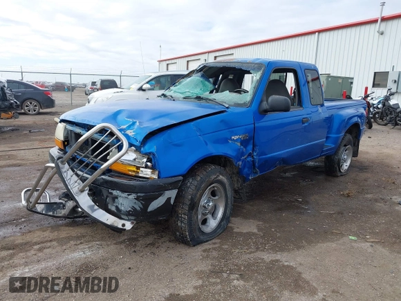 1999 Ford Ranger XL with VIN 1FTZR15V4XPB34096, listed as a IAAI auction lot 41521748 with 260,235 mi miles. Bid and sale history available at carsss.com. Image 2.