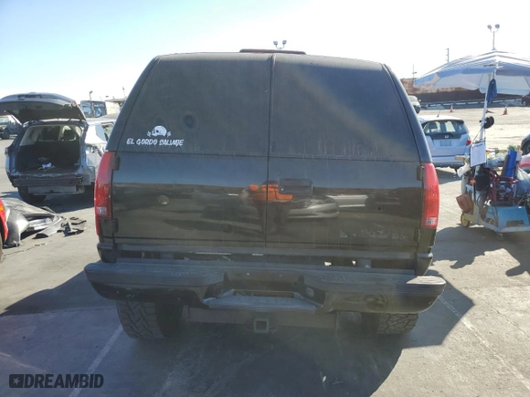 1996 Chevrolet Tahoe with VIN 3GNEK18RXTG150164, listed as a Copart auction lot 77810474 with 300,287 mi miles and Salvage Title. Bid and sale history available at carsss.com. Image 6.