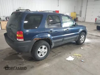 2003 Ford Escape XLT Popular with VIN 1FMYU03103KA06087, listed as a IAAI auction lot 42596326 with 210,441 mi miles and . Bid and sale history available at DreamBid. Image 4.