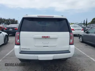 2017 GMC Yukon SLT with VIN 1GKS2BKC9HR125757, listed as a IAAI auction lot 42034182 with 72,333 mi miles. Bid and sale history available at carsss.com. Image 16.