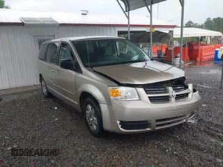 2009 Dodge Grand Caravan SE z VIN 2D8HN44E59R585342, wystawiony jako IAAI lot #42241676 z przebiegiem 329 636 mil mil oraz . Historia ofert i sprzedaży dostępna na DreamBid. Obrazek 1.