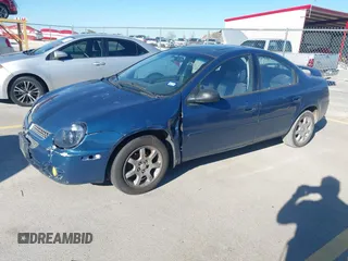 2003 Dodge Neon SXT with VIN 1B3ES56C43D150870, listed as a IAAI auction lot 41478965 with 219,292 mi miles. Bid and sale history available at carsss.com. Image 2.