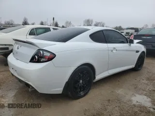 2008 Hyundai Tiburon GS z VIN KMHHM66DX8U290154, wystawiony jako Copart lot #67054434 z przebiegiem 191 963 mil mil oraz Nie do naprawy • Non repairable. Historia ofert i sprzedaży dostępna na DreamBid. Obrazek 3.