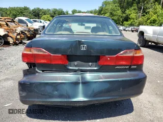 2000 Honda Accord EX с VIN 1HGCG1655YA034444, выставлен на аукционе Copart как лот 58974485 с пробегом 239 959 миль миль и Списание • Salvage title. История ставок и продаж доступна на DreamBid. Изображение 6.