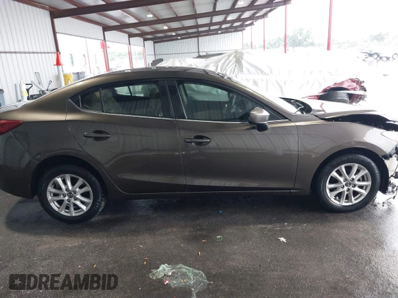 2015 Mazda 3 i Touring with VIN 3MZBM1V72FM215729, listed as a IAAI auction lot 42191673 with 141,471 mi miles and . Bid and sale history available at DreamBid. Image 14.