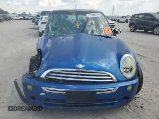 2006 MINI Hardtop with VIN WMWRC33566TK15023, listed as a Copart auction lot 76392014 with Not provided miles and Salvage title. Bid and sale history available at DreamBid. Image 5.