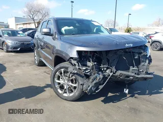 2019 Jeep Grand Cherokee Summit with VIN 1C4RJFJG0KC553199, listed as a IAAI auction lot 41352836 with 67,556 mi miles. Bid and sale history available at carsss.com. Image 1.