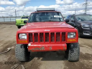2000 Jeep Cherokee with VIN 1J4FF48S0YL113246, listed as a Copart auction lot 51861455 with 180,965 mi miles and Clean title. Bid and sale history available at DreamBid. Image 5.