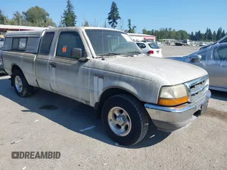 1999 Ford Ranger XL with VIN 1FTYR14V9XPA74071, listed as a IAAI auction lot 42828910 with 198,498 mi miles and . Bid and sale history available at DreamBid. Image 1.