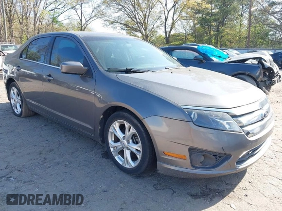 2012 Ford Fusion SE z VIN 3FAHP0HA4CR306608, wystawiony jako IAAI lot #41939924 z przebiegiem 176 689 mil mil oraz . Historia ofert i sprzedaży dostępna na DreamBid. Obrazek 1.