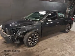 2018 Nissan Altima SR with VIN 1N4AL3AP2JC142302, listed as a IAAI auction lot 42013171 with 112,360 mi miles and . Bid and sale history available at carsss.com. Image 18.