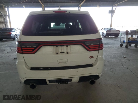 2014 Dodge Durango R/T z VIN 1C4SDJCTXEC345261, wystawiony jako Copart lot #52190285 z przebiegiem 172 035 mil mil oraz Szkoda całkowita • Salvage title. Historia ofert i sprzedaży dostępna na DreamBid. Obrazek 6.