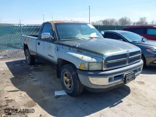 1996 Dodge Ram 1500 with VIN 1B7HC16ZXTS607019, listed as a IAAI auction lot 41908874 with 103,873 mi miles. Bid and sale history available at carsss.com. Image 1.