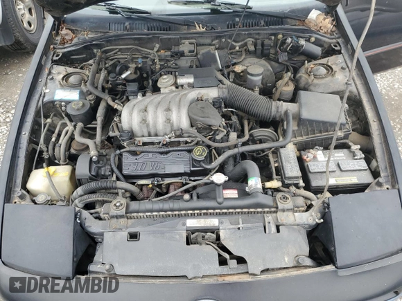 1991 Ford Probe z VIN 1ZVPT21U6M5183817, wystawiony jako Copart lot #78730774 z przebiegiem 47 047 mil mil oraz Szkoda całkowita • Salvage title. Historia ofert i sprzedaży dostępna na DreamBid. Obrazek 11.